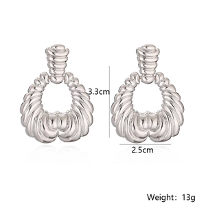 Detail view of irregular geometric silver drop earrings showing 3.3cm height and 2.5cm width