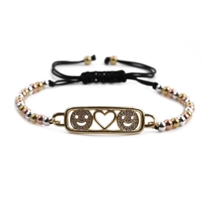 Verstellbares gewebtes Armband mit vergoldetem Herz- und Smiley-Anhänger für Damen