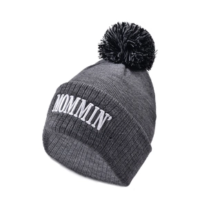 Detailed knit texture of dark grey beanie with MOMMIN embroidery and black pompom