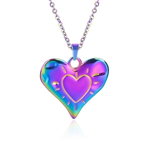 Macro shot of iridescent heart pendant necklace featuring double-layered design with cable chain