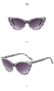Detailed views of cat-eye sunglasses with snakeskin pattern and purple gradient lenses
