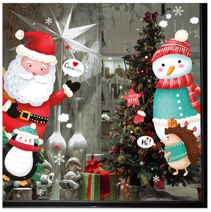 Detailed view of Santa, snowman, and penguin festive Christmas window stickers on glass