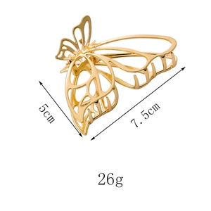 Hollow butterfly hair claw clip dimensions 7.5cm by 5cm in gold finish and 26g weight