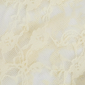 Gros plan sur le tissu en dentelle florale blanc crème avec maille détaillée