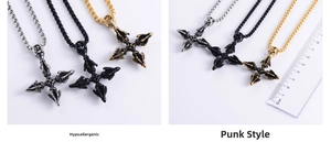 Detailed view of three punk vajra cross pendants with ruler measurement and ball chain