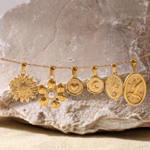 Elegant 18K gold-plated necklace pendants featuring nature and geometric motifs