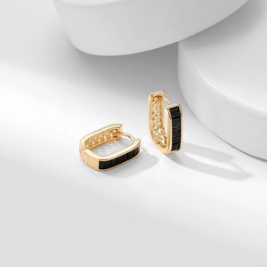 Elegant U-shaped gold earrings with rectangular black zircon row inlay on white stones