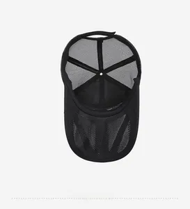 Detail view of the breathable mesh interior and sweatband of this black fishing cap