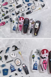 Macro detail of 5D Halloween nail decals featuring vampire, bat and coffin patterns