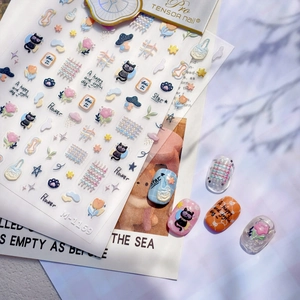 Cute embossed nail stickers featuring cats and tulips with soft pastel macaron tones