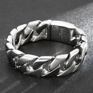 Detailed view of a thick silver Cuban link bracelet made of premium titanium steel