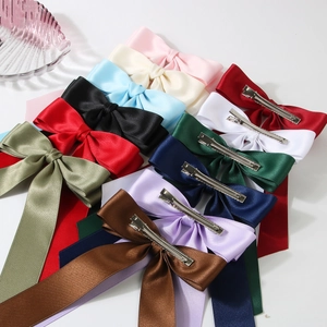 Assorted colorful double-layer satin bow hair clips with metal alligator grip attachments