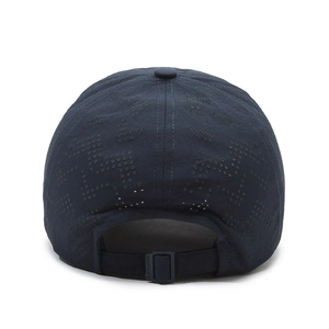 Lightweight navy blue sun hat with laser-cut holes and adjustable back buckle