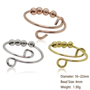 Three-color stainless steel anxiety ring with movable beads in gold, silver, and rose gold