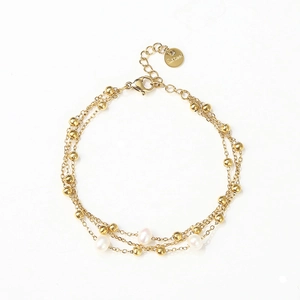 Three-layer gold stainless steel chain bracelet with elegant white pearls for women