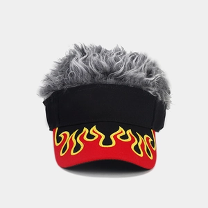 Detailed embroidery of yellow flame pattern on the red visor of the baseball cap
