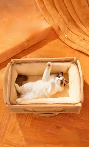 Macro detail of warm plush lining and large interior space in the beige pet carrier