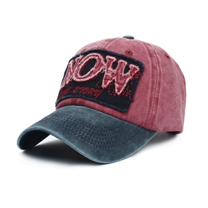 Vintage washed baseball cap with distressed 'NOW' patch and embroidery in burgundy and grey