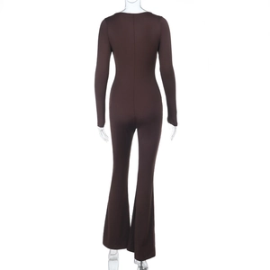 Back view of dark brown slim fit long sleeve jumpsuit with flared legs on a mannequin
