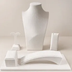 Professional beige velvet jewelry display set including necklace bust and earring stands
