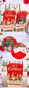 Detail of Christmas chair covers featuring festive Santa and reindeer prints on red fabric