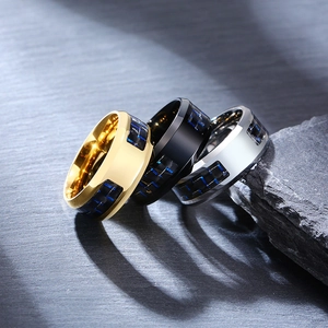 Set of three 8mm stainless steel rings for men with blue carbon fiber inlay on dark rock