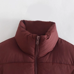 Deep red stand collar vest jacket with full-length zipper detail and padded texture