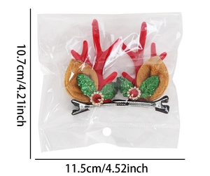 Detail of Christmas reindeer antler hair clips in packaging with size dimensions shown