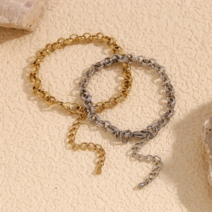 14K gold and silver plated wheat grain round chain bracelets for women on stone background