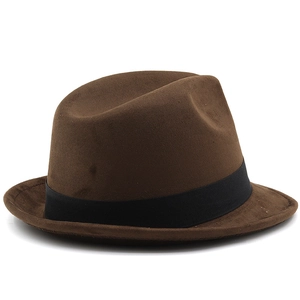 Detail of dark brown fedora hat featuring a wool felt texture and a wide black ribbon band