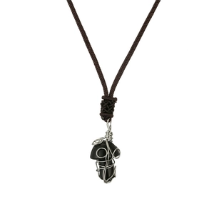 Detailed view of handmade wire-wrapped black stone mushroom pendant on a braided cord