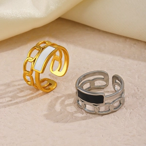 Adjustable stainless steel chain rings with minimalist black and white enamel inserts
