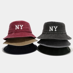 Washed cotton bucket hats in six colors with NY embroidery and vintage finish