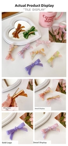 Detail of acetate bow hair clips with alloy base and France Handmade logo engraving