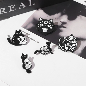 Dark gothic black cat and skull enamel pins set with celestial and floral motifs