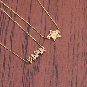 Gold-plated MAMA and star-shaped MOM necklaces with colorful zircon stones on wood surface