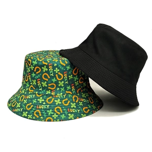 St. Patrick's Day cotton bucket hat set with green clover print and black minimalist design