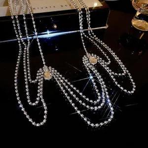Luxurious multi-layer silver body chain featuring sparkling rhinestones and pear drops