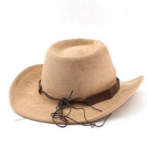 Macro shot of faux suede texture and leather belt detail on tan western cowboy hat