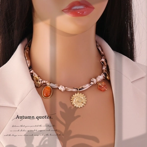 Luxurious rose heart ribbon necklace with golden sunflower and amber gemstone pendant