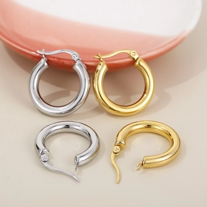 Polished solid stainless steel hoop earrings in gold and silver finishes for women
