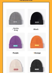 Detail display of New York embroidered beanies in gray, black, purple, and orange colors