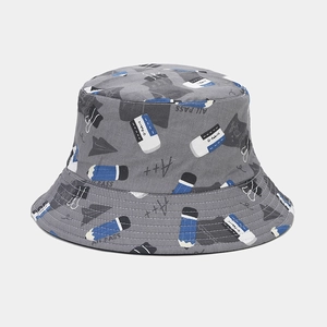 Detail of grey cotton bucket hat featuring all-over stationery prints and fine stitching