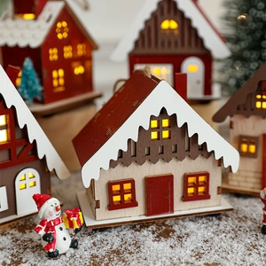 Luminous Christmas wooden house ornaments with warm LED lights and snowy scene decor