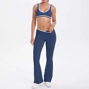 Detail of high-waist yoga pants with V-shaped waistband and white contrast piping trim