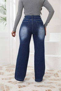 Vista posteriore di jeans a gamba larga a vita alta con lavaggio vintage e doppie tasche