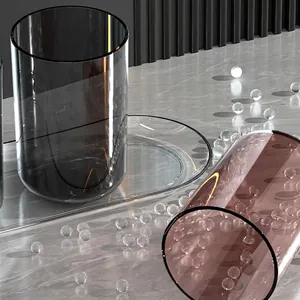 Modern minimalist smoke gray glass mouthwash cup set with transparent storage tray