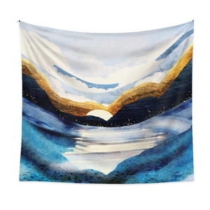 Detail of modern abstract mountain tapestry with blue and gold textured finish