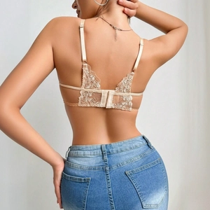 Back view of champagne lace embroidery bra with adjustable straps and hook-and-eye closure