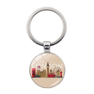 London themed metal keychain with glass dome pendant featuring Big Ben and red bus